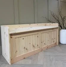 Unpainted, natural wood Storage bench...