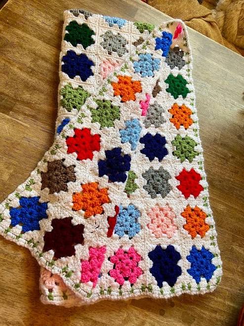 white colorful granny square crochete...