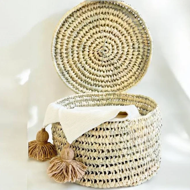 Storage boxes with woven palm leaf li...