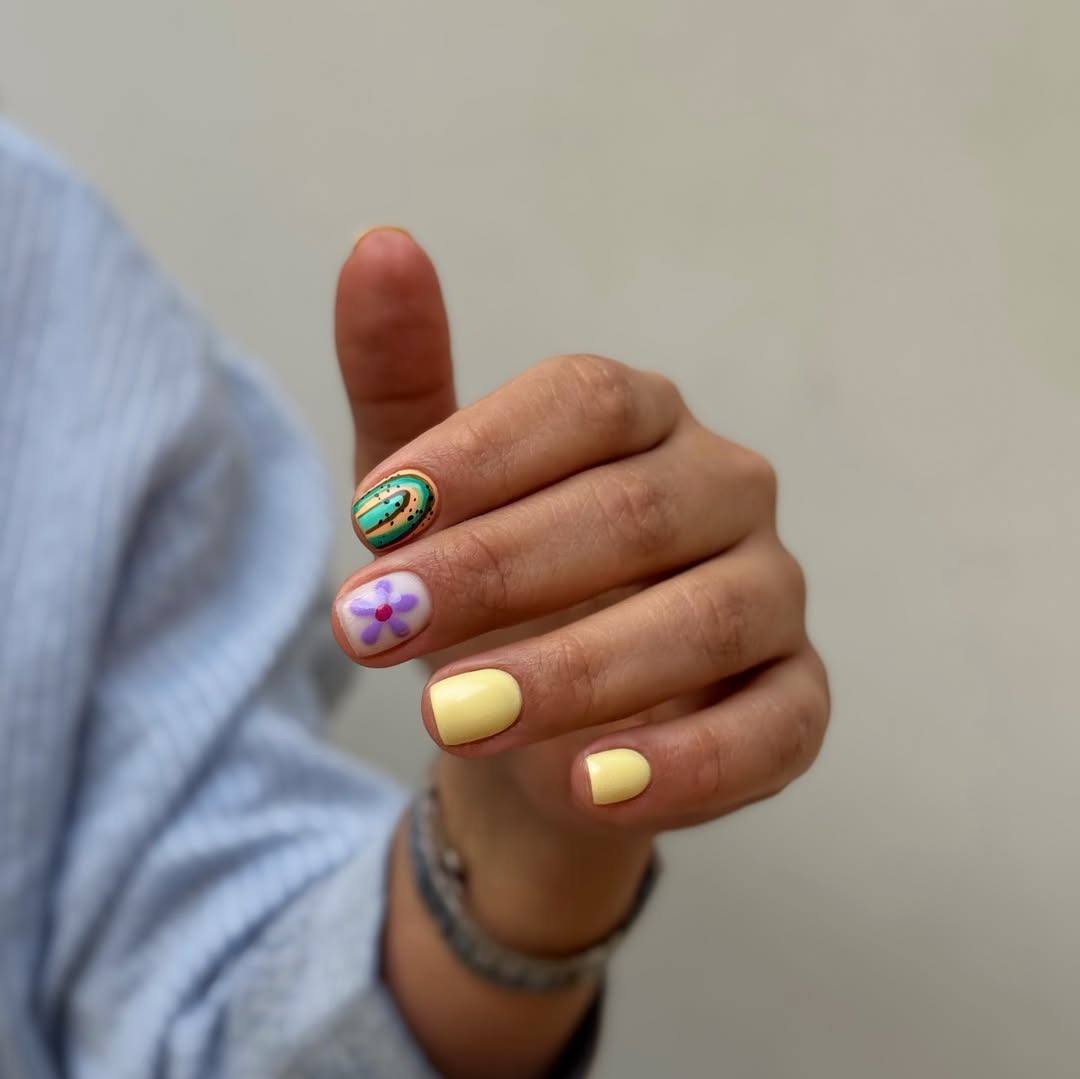Playful Pastel Yellow Floral and Abstract Short Round Nails