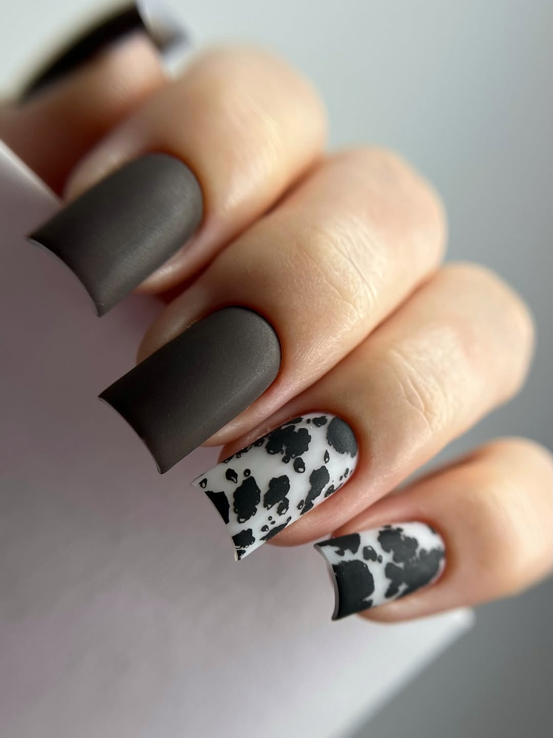 Matte Charcoal And Cow Print Coffin Nails