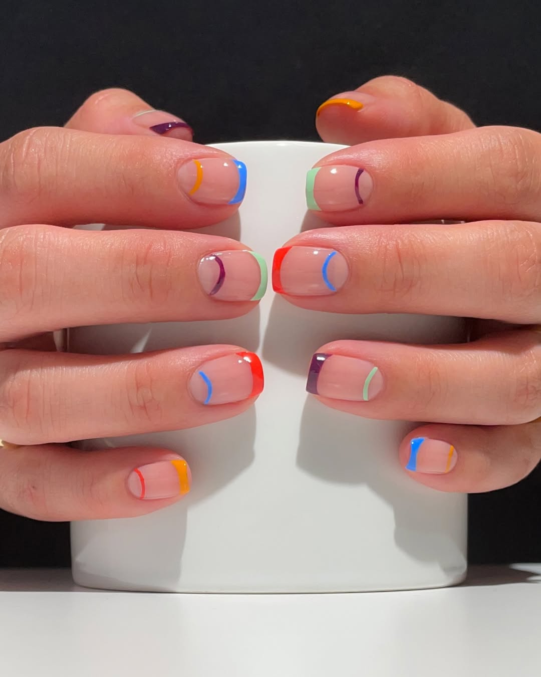 Vibrant Rainbow Abstract French Tip Nails