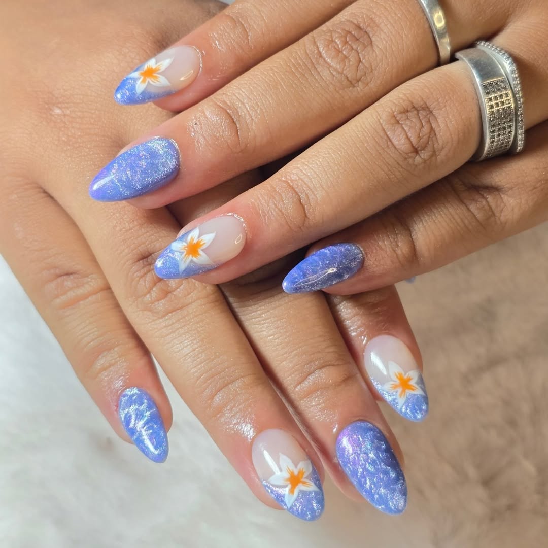 Lavender Shimmer Almond Nails with Floral Accents