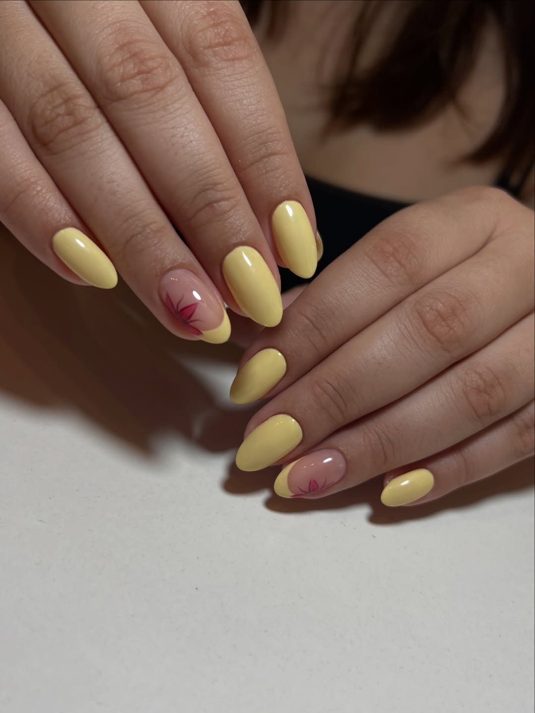 Sunny Yellow Almond Nails with Floral Accents