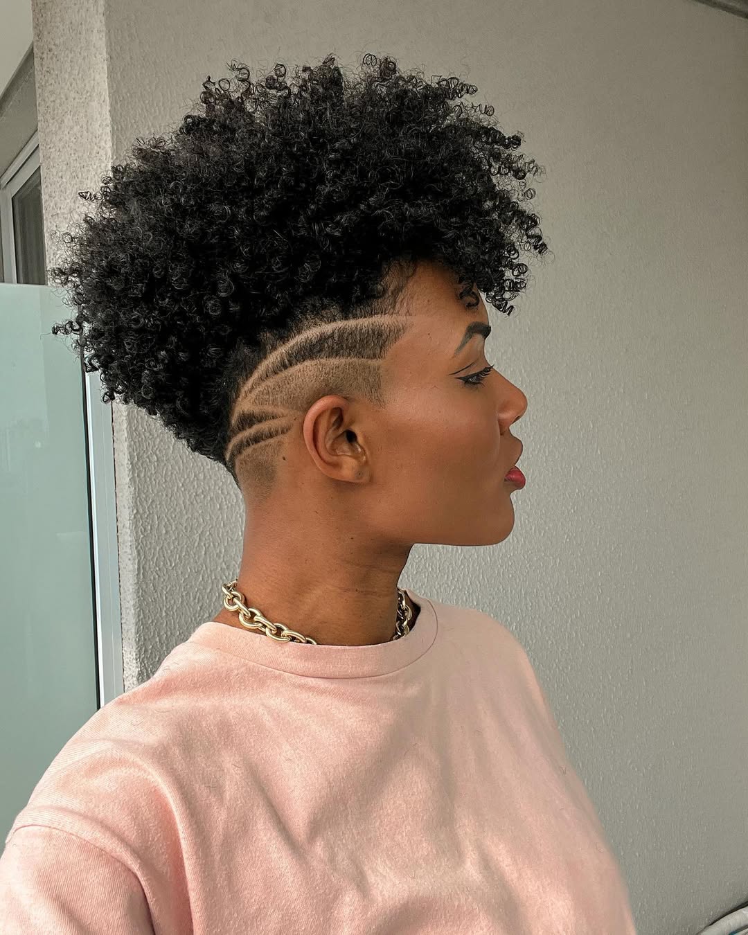 Defined Curly Top With Edgy Shaved Design